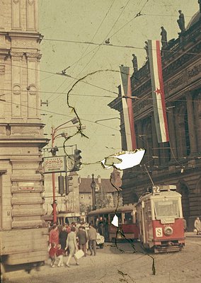 Vintage sepia-toned street scene featuring a red tram labeled "S" navigating tangled overhead wires. Pedestrians in 1960s-era...