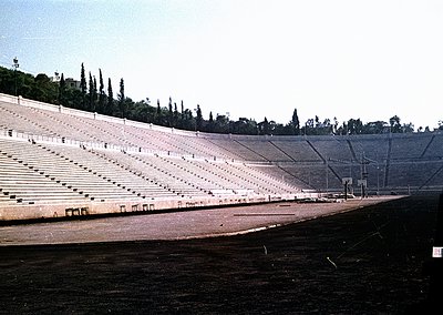 Panathenaic Stadium, Athens, Greece—iconic 19th-century marble stadium built for the 1896 Olympics, still in use. Symmetrical...