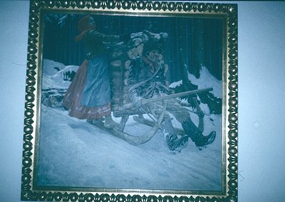 Vintage sepia-toned illustration of two figures sledding in a forested winter landscape, framed in ornate gold. Likely 19th–e...