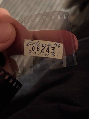 Vintage 35mm film leader with handwritten label reading "Edinburg 94 06243 807361." Likely from mid-20th century, possibly 19...