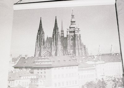 Historic Gothic cathedral with twin spires and central tower, likely **Prague Castle’s St. Vitus Cathedral**. Architectural d...