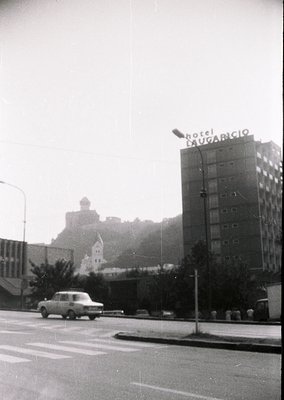 Black-and-white urban street scene featuring **Hotel Dugaricio** (1960s-70s style signage) in foreground, likely **Sofia, Bul...