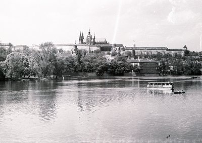 Vistula River panorama of the Wawel Royal Castle and Barbican in Kraków, Poland, mid-20th century. Gothic spires dominate the...