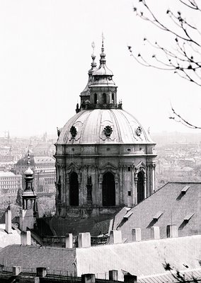 Baroque-style dome with ornate copper roofing and decorative finials, likely part of St. Stephen’s Basilica, Budapest. Urban ...