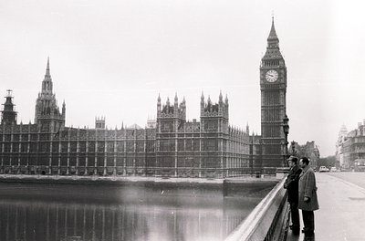 Black-and-white shot of **Big Ben and Houses of Parliament** from Westminster Bridge, featuring scaffolding on the clock towe...