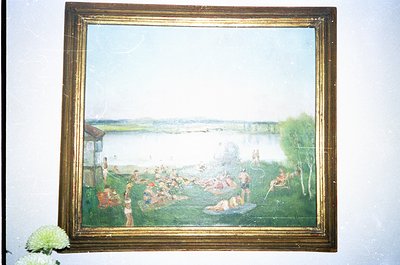 Vintage impressionistic painting depicting a lakeside gathering, likely late 19th to early 20th century. Golden frame with vi...