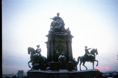 Equestrian monument featuring four life-sized bronze figures atop a stone pedestal, likely from the late 19th to early 20th c...
