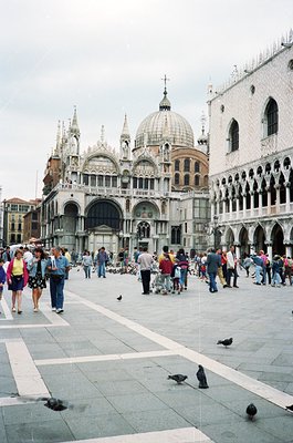 St. Mark’s Square (*Piazza San Marco*) in Venice, Italy, showcasing the iconic **Doge’s Palace** with its Gothic façade and c...