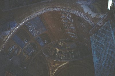 Vibrant Byzantine-style mosaic depicting religious iconography, featuring gold leaf and intricate geometric patterns. Central...