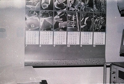 Vintage 1960s–70s wall calendar featuring close-up X-ray images of hands, fingers, and bones. Each month displays skeletal va...