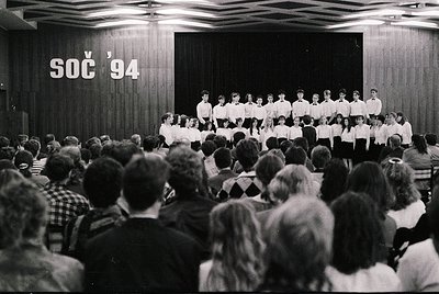 Young choir performing on stage at **SOC '94** event, likely a youth festival in Czechoslovakia (now Czech Republic/Slovakia)...