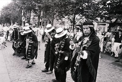 Traditional folk band in ornate costumes, likely Bulgarian