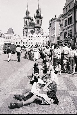 Crowd gathers in Prague’s Old Town Square, 1960s, with Gothic spires of Church of Our Lady before the Virgin Mary and St. Jam...