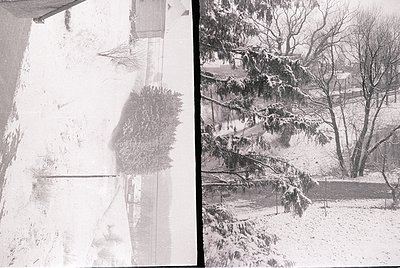 Vintage black-and-white split image: left side shows a snow-covered urban wall with faint graffiti or shadowed text; right si...