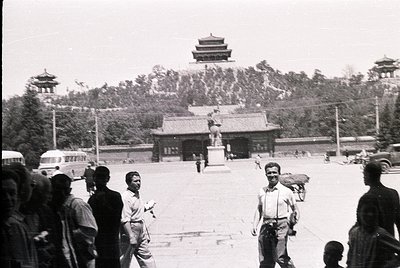 Classic black-and-white shot of Tiananmen Square, Beijing, featuring the iconic **Tiananmen Gate** in the background. Mid-20t...