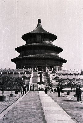 Classic **Temple of Heaven** circular hall in Beijing, China, showcasing Ming Dynasty architecture. Symmetrical stone pathway...