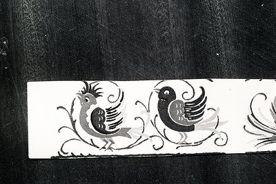 Decorative relief featuring stylized roosters with ornate scrollwork, likely from a 19th-century European textile or furnitur...