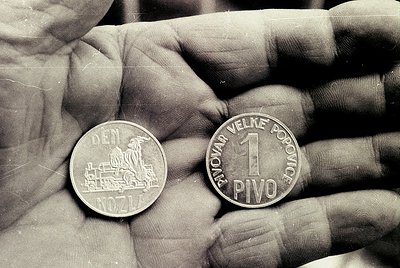 1971 Czechoslovakian 1 *Pivo* (1 Koruna) coin featuring locomotive design on reverse, "DEN" (Den national) on obverse. Black-...