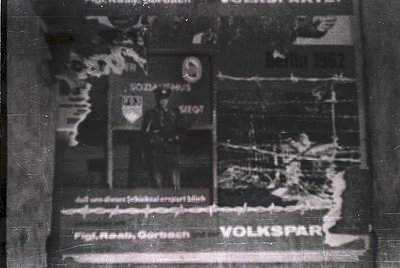 Vintage black-and-white poster advertising "Volkspark" in German, featuring a blurred illustration of a park scene with a bri...