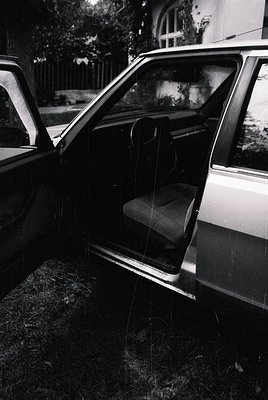 Classic mid-century station wagon interior, likely a **Volkswagen Type 4 (Bus)** or similar 1960s-70s model. Open door reveal...