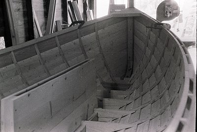 Industrial concrete staircase with exposed formwork and rough finish, likely mid-construction. Reinforced edges and structura...