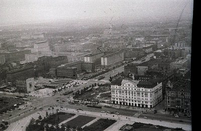 High-angle view of Varna, Bulgaria, showcasing a blend of architectural styles. The imposing, modernist Palace of Culture and...
