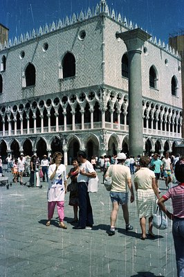 Palazzo Ducale (Doge’s Palace) in Venice, Italy. Exterior view showcasing intricate Gothic architecture and arched windows. C...