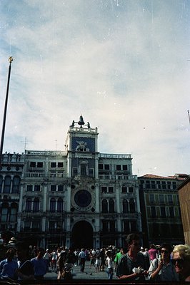 Palazzo Doge, Venice, Italy. A crowd gathers on the Piazzetta San Marco, framed by the basilica and this iconic Venetian pala...