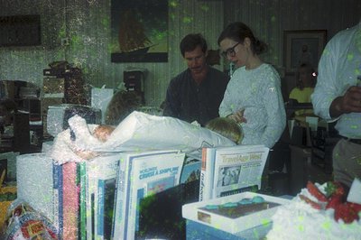 Vintage travel agency interior with staff handling luggage. Woman in 1970s-style blouse assists a seated passenger with a rol...