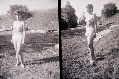 A young woman stands on a grassy slope, facing the camera in a vintage floral-patterned bikini. A second image shows her from...