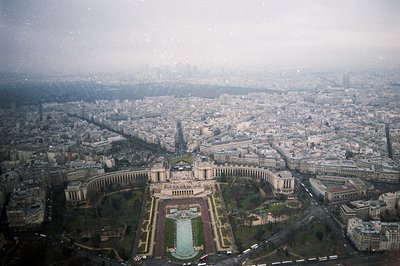 High-angle view of the Palais de Chaillot, Paris, featuring a central pool and expansive courtyard design. Urban landscape ex...