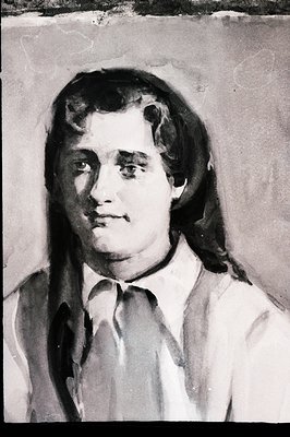 Monochrome portrait of a man with long hair and a light-colored shirt and tie. Subject displays a subtle, enigmatic smile. Th...