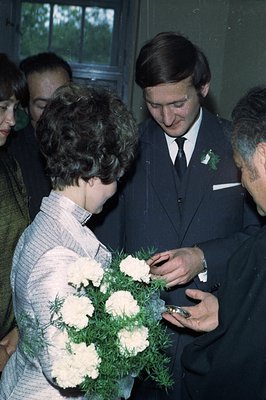 Prince Charles and Lady Diana Spencer exchange rings during their wedding ceremony, 1981. A close-up shows Charles' hand hold...