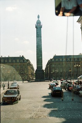 A view of the Place de la Concorde in Paris, France, featuring the Luxor Obelisk, flanked by ornate buildings & street lamps....