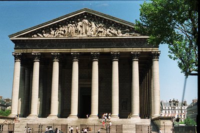 Monumental neoclassical architecture: the Panthéon in Paris, France. Massive Corinthian columns support a triangular pediment...