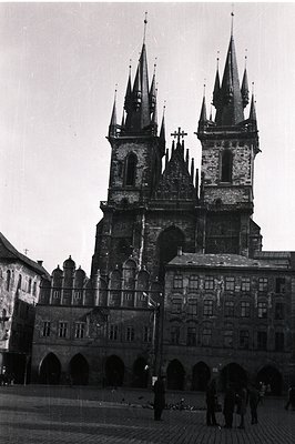 Striking black and white photograph of Prague’s Týn Church, showcasing its distinctive Gothic spires & intricate facade. A la...