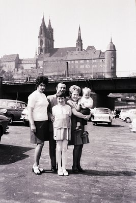 Family portrait in front of the **Magdeburg Cathedral** (St. Maurice’s Church), a Gothic landmark in Magdeburg, Germany. Four...