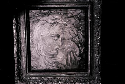 Striking portrait in a decorative, dark frame. Subject appears distressed, hand raised to face. Thick impasto texture suggest...