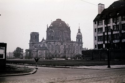 Neoclassical cathedral with Baroque dome and twin towers, likely Berlin’s **Gedächtniskirche**, captured mid-20th century. Ur...