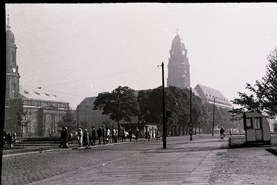 Black-and-white street scene featuring **Hamburg’s St. Michaelis Church** (18th-century Baroque) and **St. Nikolai Church** (...