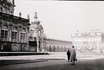Baroque-style palace courtyard with ornate domed fountain and symmetrical wings, likely **Sanssouci Palace, Potsdam, Germany ...