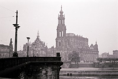 Historic black-and-white photo of Dresden Cathedral (Frauenkirche) and surrounding Baroque architecture, likely 1920s–1940s. ...