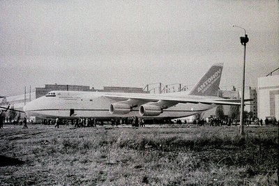 Antonov An-225 Mriya cargo aircraft on display, likely during its 1988 maiden flight or early testing phase. Crowd gathers ne...