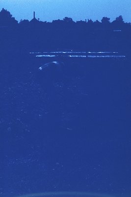 Vintage aerial view of a coastal area with a distinctive **dome-shaped structure** (likely a lighthouse or radar station) on ...
