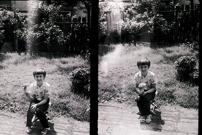 Vintage split-image portrait of a child in a backyard, mid-20th century. Left: boy squatting on concrete, holding a small obj...