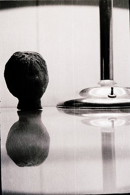 Vintage black-and-white photograph of a **Thracian gold treasure bowl** (likely 4th–3rd century BCE) with a **ceramic votive ...