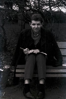 Mid-century portrait of a man sketching outdoors on a park bench, holding a paintbrush and palette. His attire—dark coat, tro...