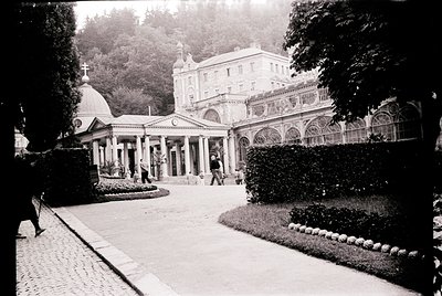Elegant early 20th-century European resort architecture with neoclassical and Art Nouveau influences. Symmetrical courtyard f...