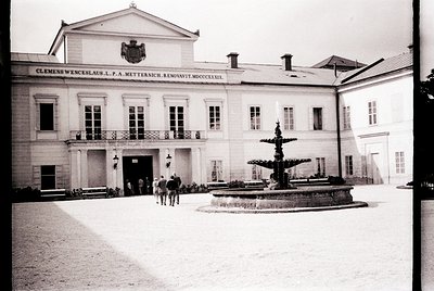 Neoclassical building with Latin inscription *"Clemens Wenceslaus, L.P.A. Metternich Renovavit MDCCCLIX"* (restored 1859) abo...
