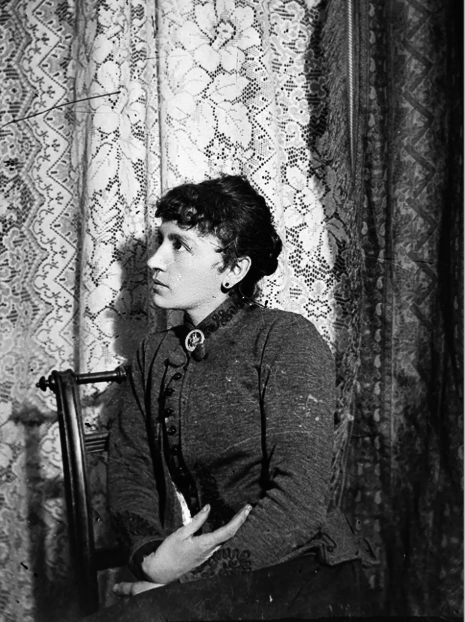 Scanned and inverted glass negative — woman in Victorian dress